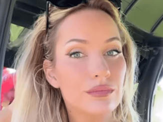 Paige Spiranac, 31, flashes a cheeky smile at camera while wearing a very low-cut green top